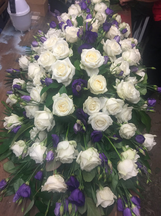 Purple & White Funeral Coffin Arrangement